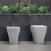 Sanitari filo muro scarico traslato Olympia serie Synthesis con sedile copri wc avvolgente