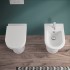 Wc filomuro Rimless in ceramica lucida scarico universale  Round 