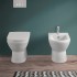 Wc filomuro Rimless in ceramica lucida scarico universale  Round 