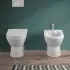 Wc filomuro Rimless in ceramica lucida scarico universale  Round 