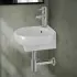 Lavabo sospeso ad angolo 39x36 in ceramica lucida con design ovale