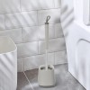Portascopino da appoggio grigio e grigio scuro con setole in silicone 