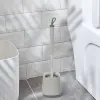 Portascopino da appoggio grigio e grigio scuro con setole in silicone 